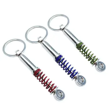 Autó kulcstartók Cinkötvözet lengéscsillapító modell Kulcstartó kulcstartó rugós lengéscsillapító medálok Belső kiegészítők Kreatív ajándék